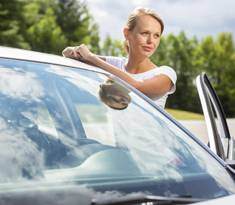 woman next to car