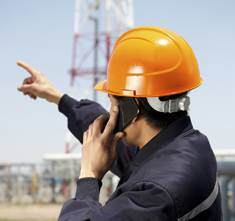 manufacturing worker with phone