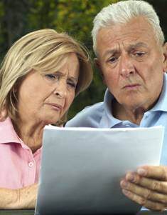 worried senior couple