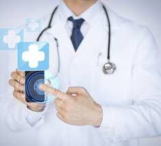 doctor holding smartphone